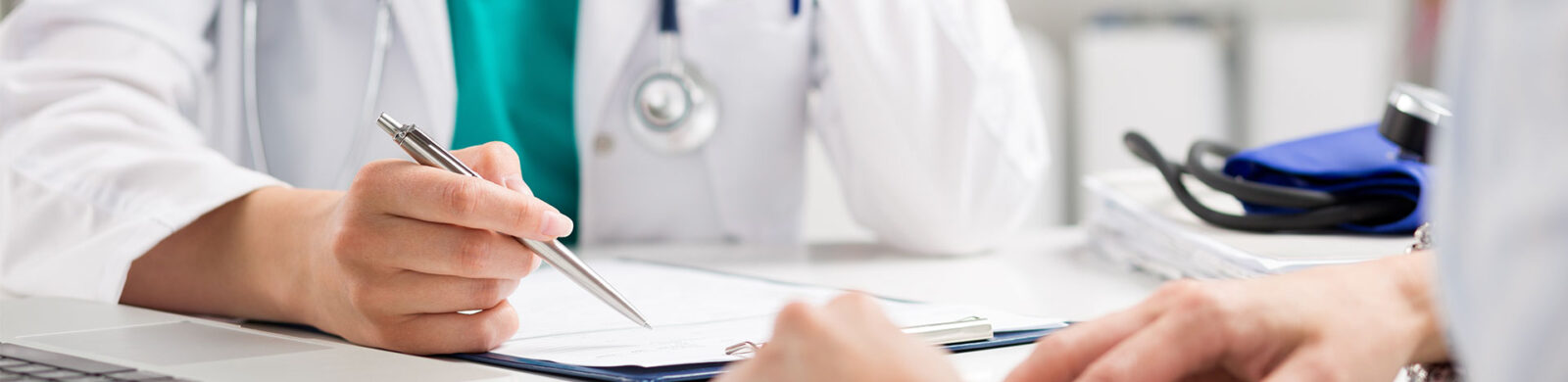 woman doctor consulting with female patient