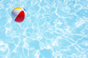 Beach ball floating in a pool - pool safety
