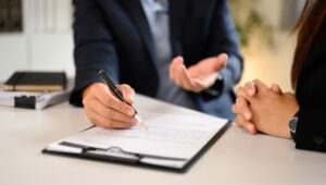 Attorney and client going over settlement